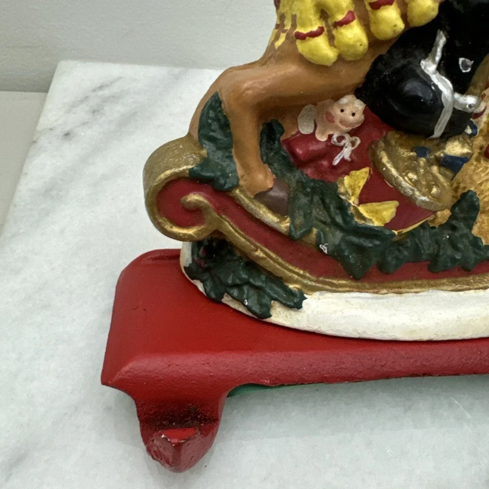 Cast Iron Christmas stocking hanger Nutcracker rocking horse double hook Vintage